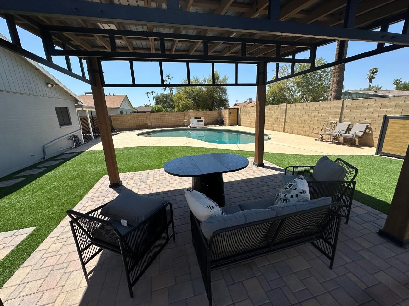 Pergola seating area and pool