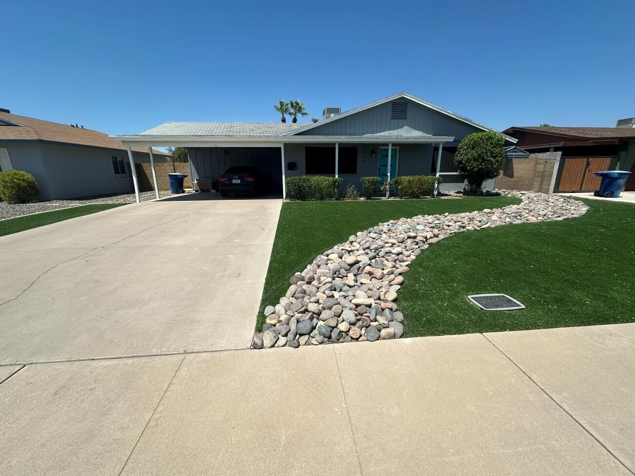 Front exterior with carport