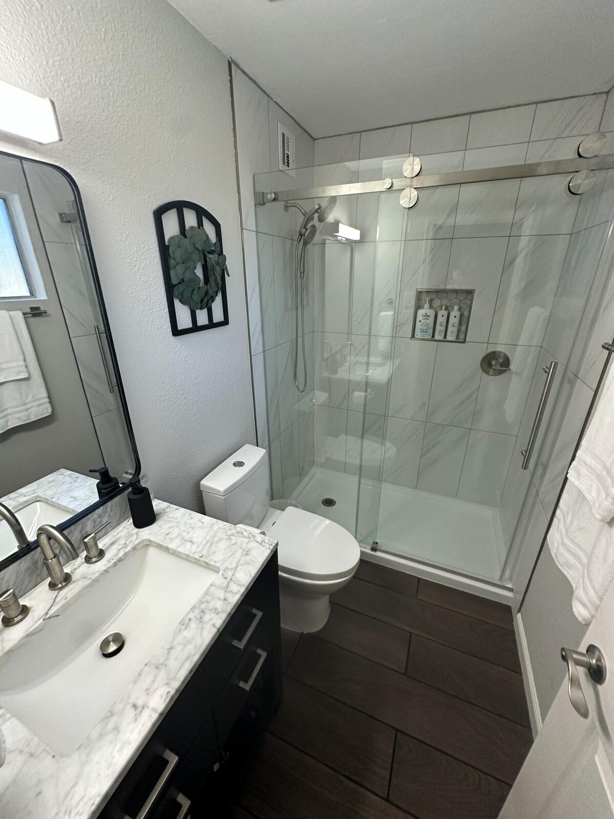 Bathroom with walk-in glass shower